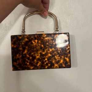 Tortoise print clutch